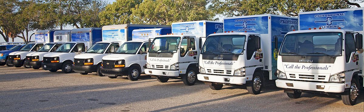 Professional Plumbing & Design trucks parked along Bayfront Park in Sarasota, Florida.